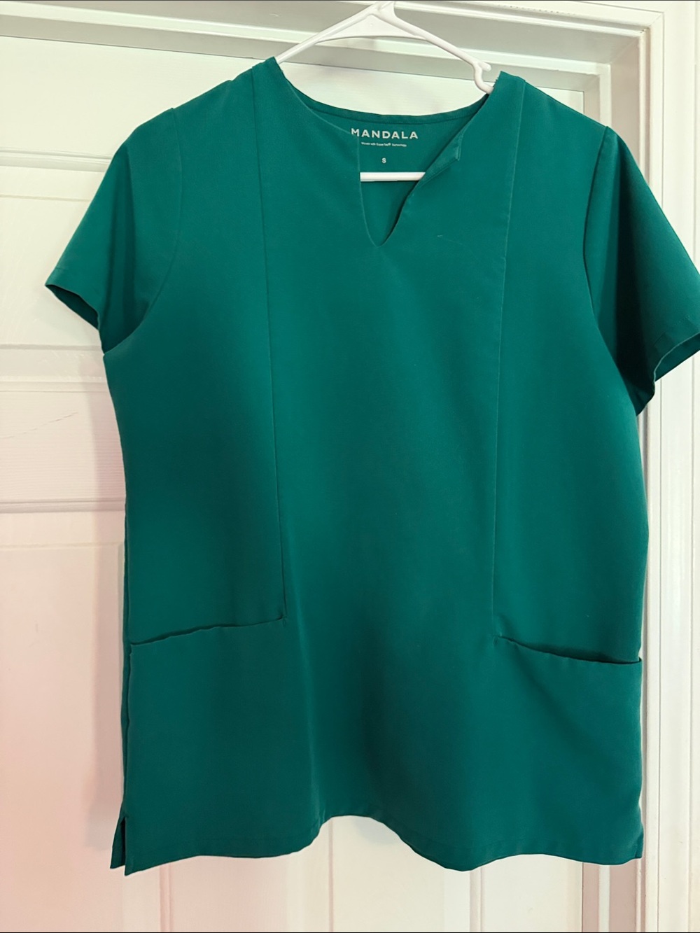 Green mandala scrub top